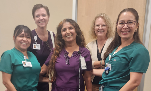 Royal Oaks employees taking a photo with Saliba's Pharmacy