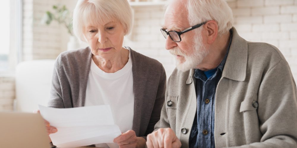 Older adults paying bills